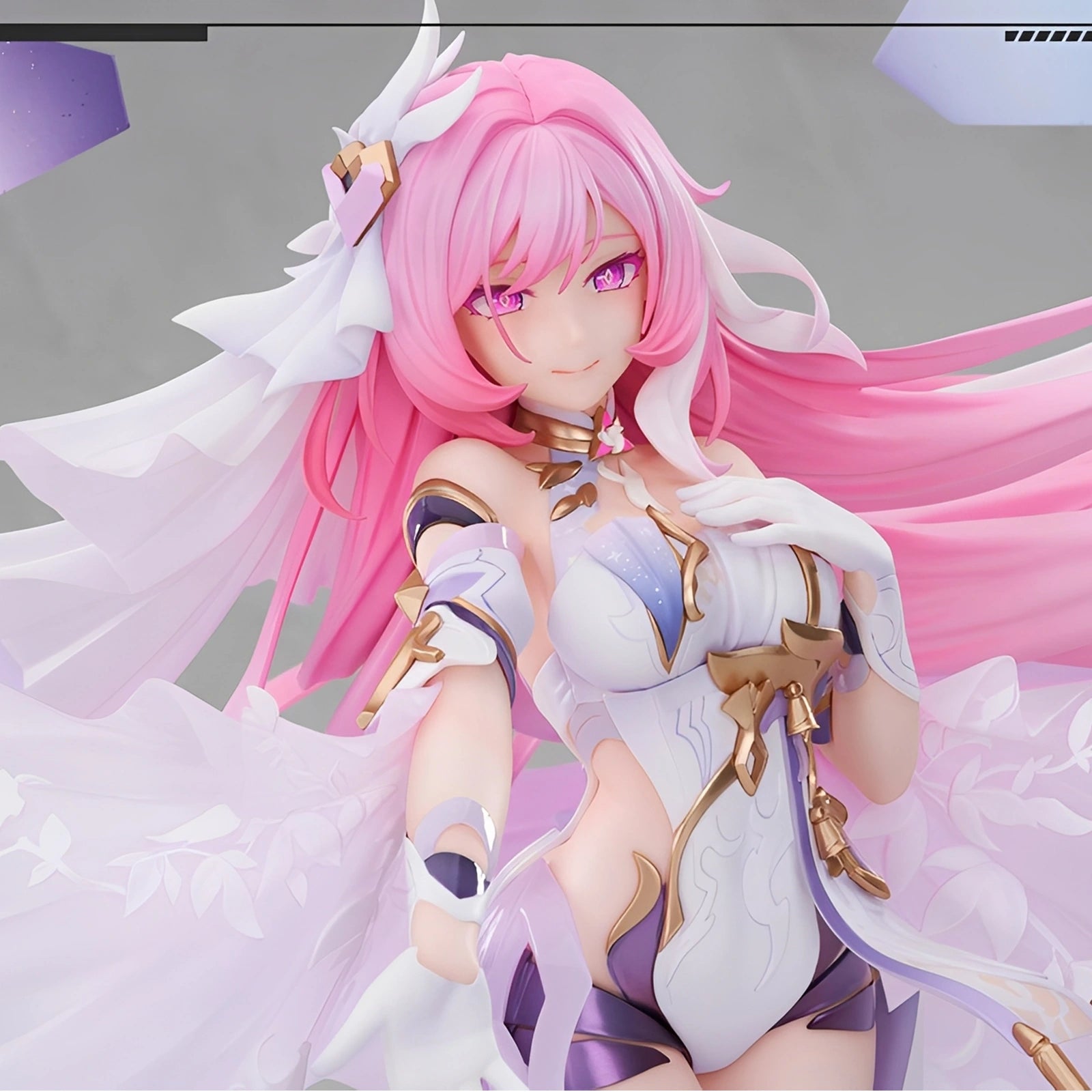 Close-up of Elysia Herrscher of Human 1/7 scale figure showing detailed face sculpt, flowing pink hair and costume design