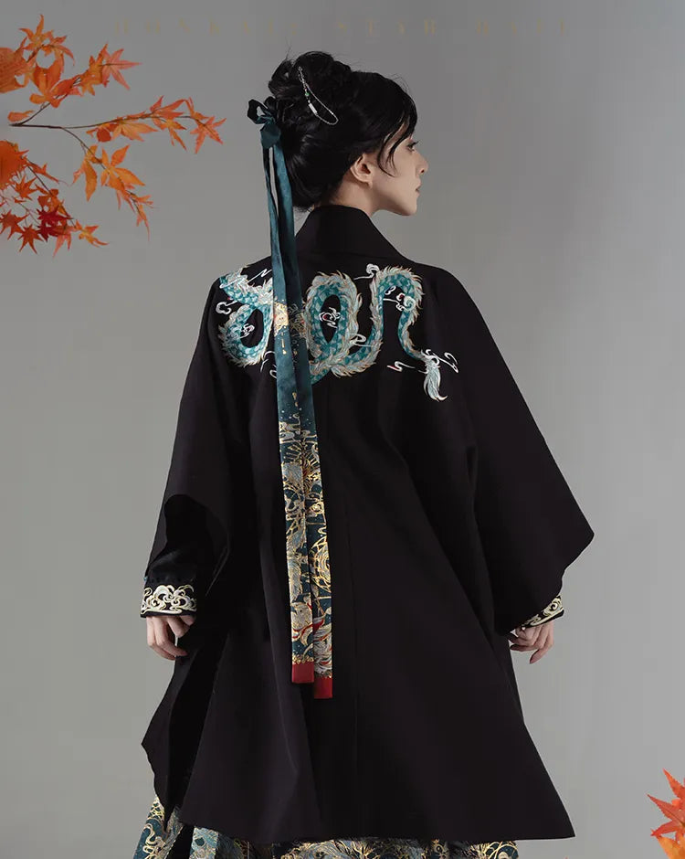 Model wearing Dan Heng Imbibitor Lunae Long Coat with wide sleeves and traditional Chinese-style silhouette