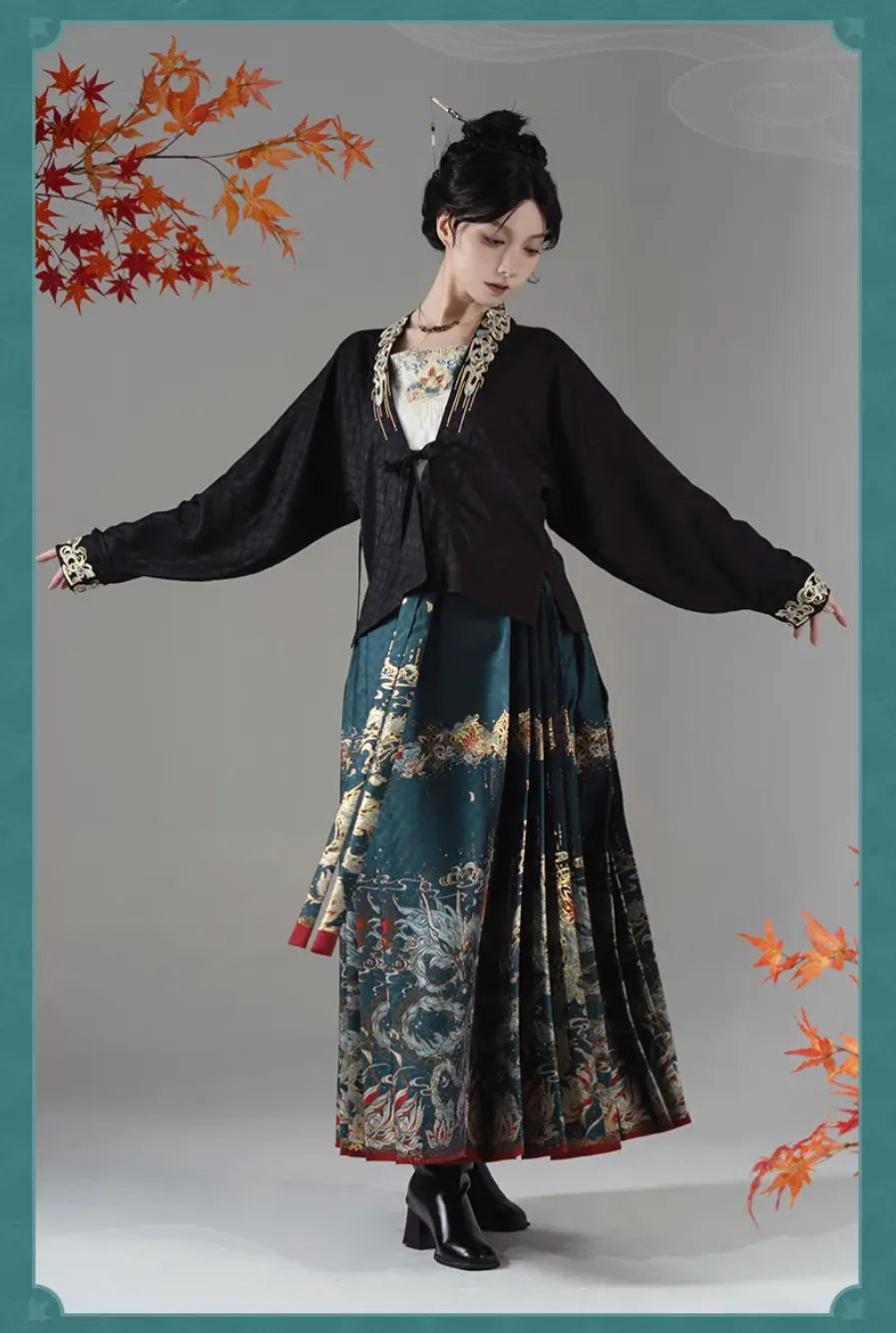 Close-up of white and black Dan Heng short jacket collars with teal and gold cloud embroidery
