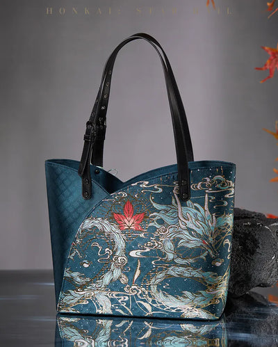 Dan Heng Imbibitor Lunae teal tote bag with gold dragon patterns, black shoulder straps and tassel charm