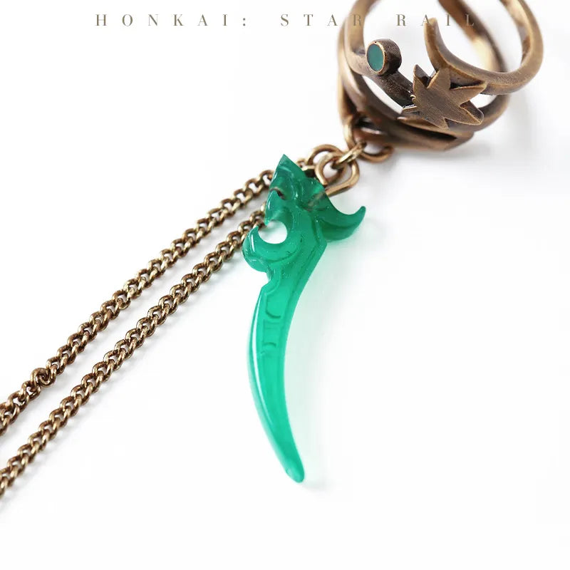 Dan Heng Impression Series dangling ear clip featuring maple leaf and dragon blade charms