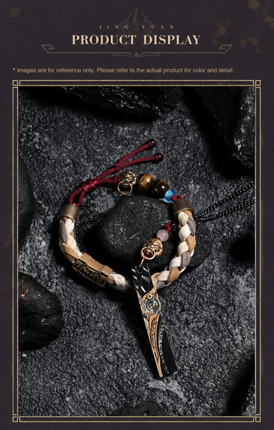 Jing Yuan necklace and bracelet displayed together on stone background