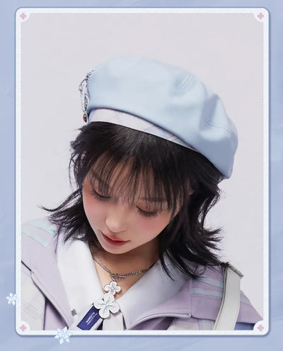 March 7th beret side view with floral chain decoration