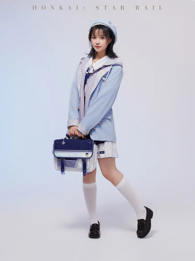 March 7th beret styled with a matching pastel-blue outfit