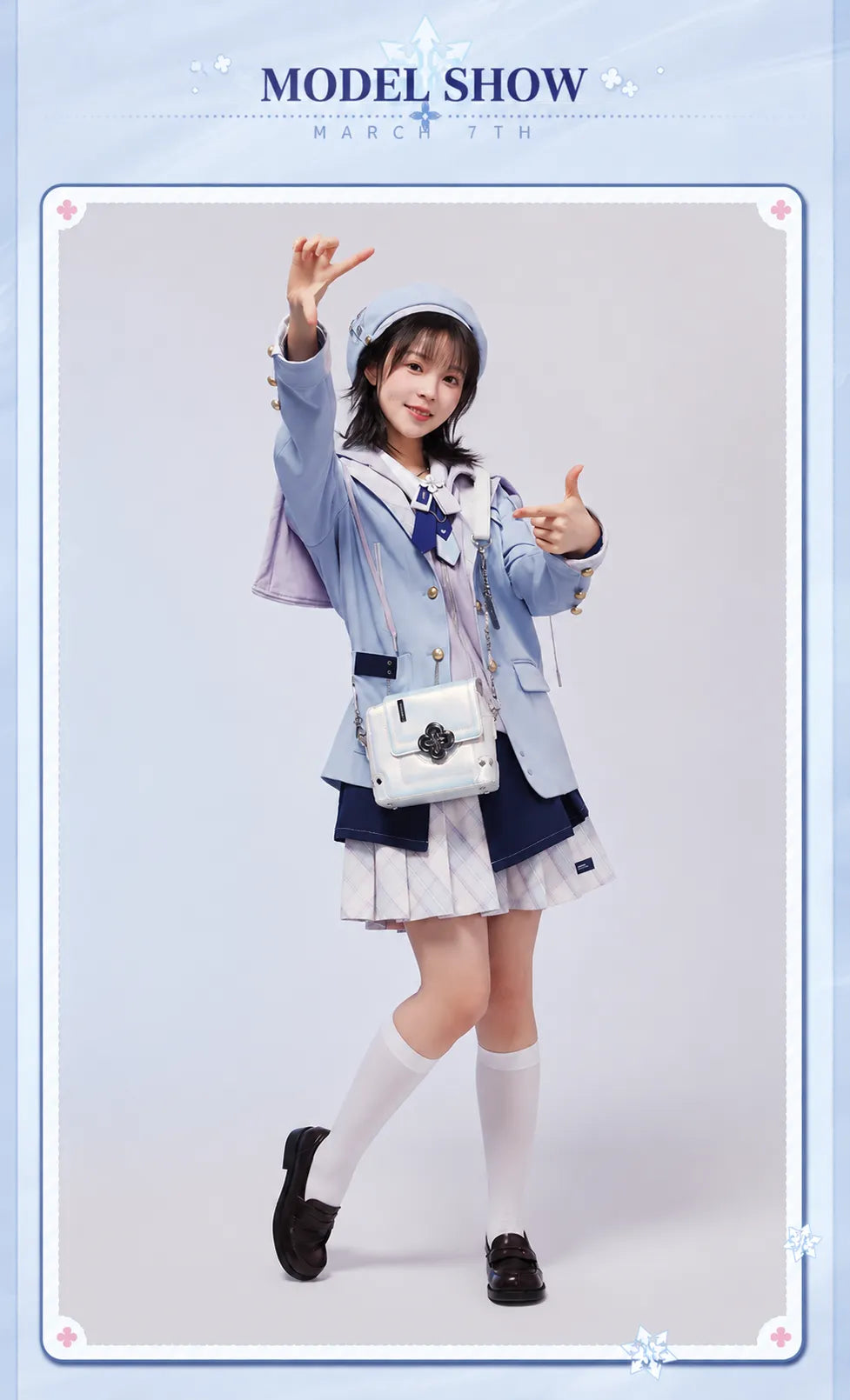 Model wearing March 7th shoulder bag with matching themed outfit