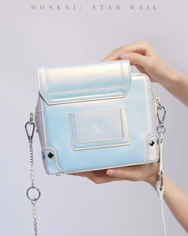 March 7th shoulder bag with iridescent finish and floral clasp