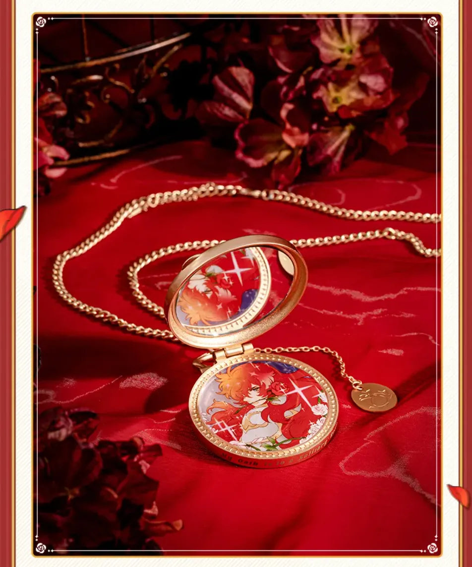 Pocket watch-style metal charm displayed with interchangeable Argenti artwork