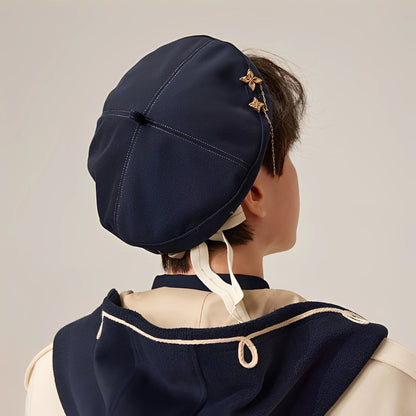 Back view of Genshin Impact Albedo theme navy beret showing adjustable tie and embroidery details
