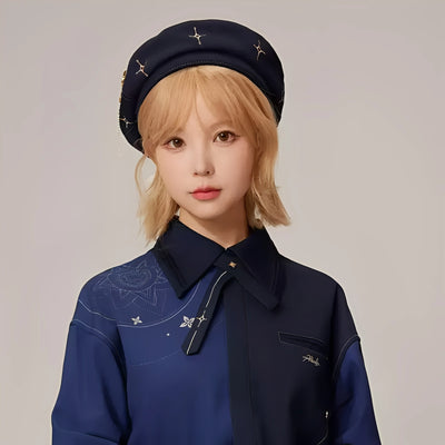 Front portrait view of Albedo theme navy beret from Genshin Impact with gold star embroidery
