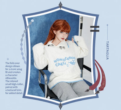 Tartaglia knit sweater with light blue contrast trim on collar cuffs and hem