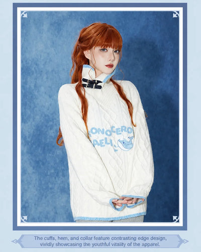 Tartaglia knit sweater with convertible high collar and buckle details