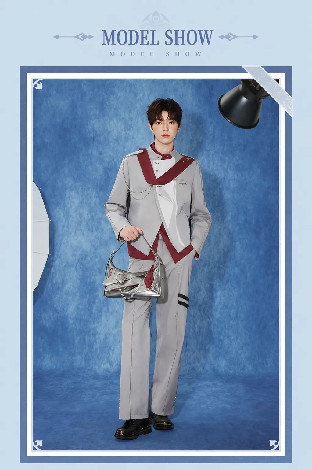 Female model styling the Tartaglia silver shoulder bag with themed outfit
